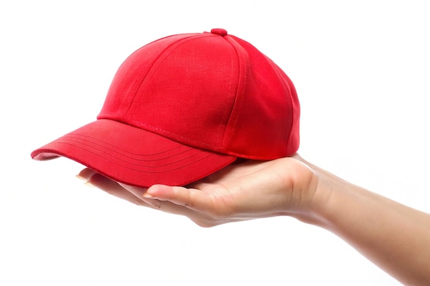 Photo hand holding cap red isolated on white background