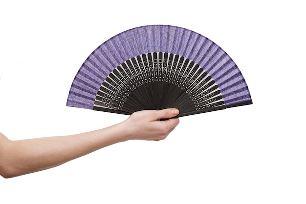 Photo hand holding fan isolated on white background