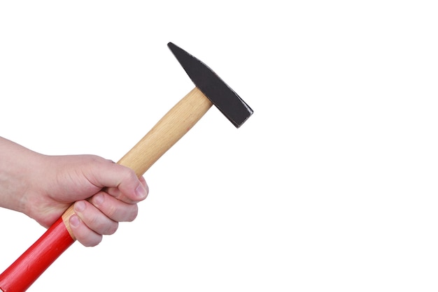 The hand holding the hammer isolated on a white background