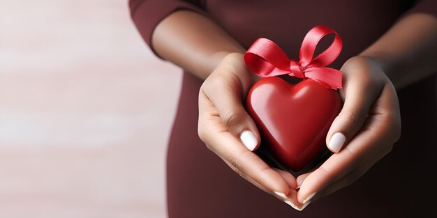 hand holding heart shaped cakes and chocolate cookies