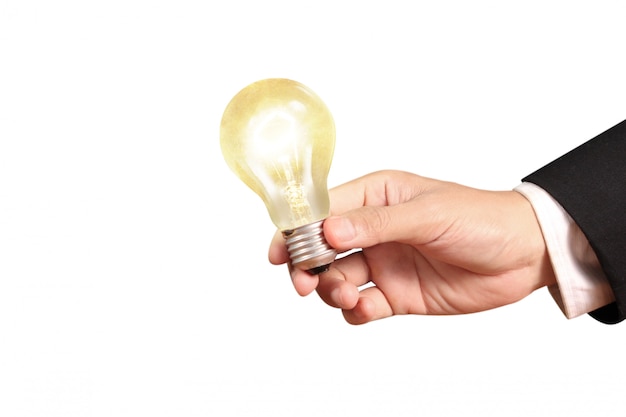 Hand of holding illuminated light bulb, innovation inspiration concept 