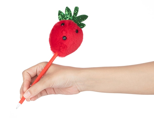 Hand holding Lovely Strawberry plush pen isolated on white background