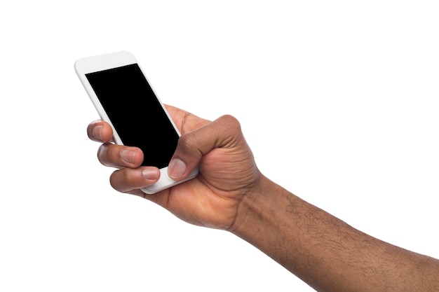 Hand holding mobile smartphone with blank screen, isolated on white background. Copy space for advertisement of mobile app, mockup