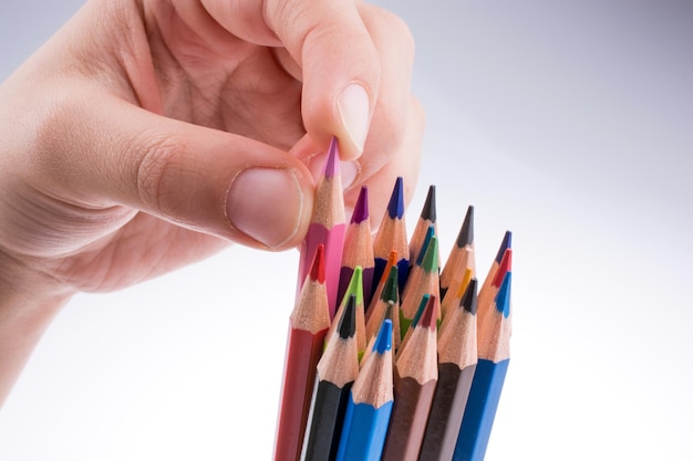 Hand holding Pencils