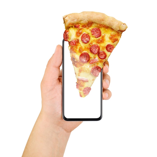 Photo hand holding smartphone with slice of pepperoni pizza on the screen isolated on white