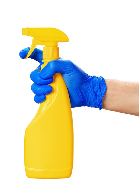 Hand holding spray bottles isolated against white background. close up