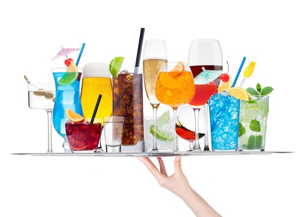 Hand holding tray with various cocktails with ice isolated on white backgroundBlue lagoon martini negroni mojito spritz gimlet cuba libre cosmopolitan margarita