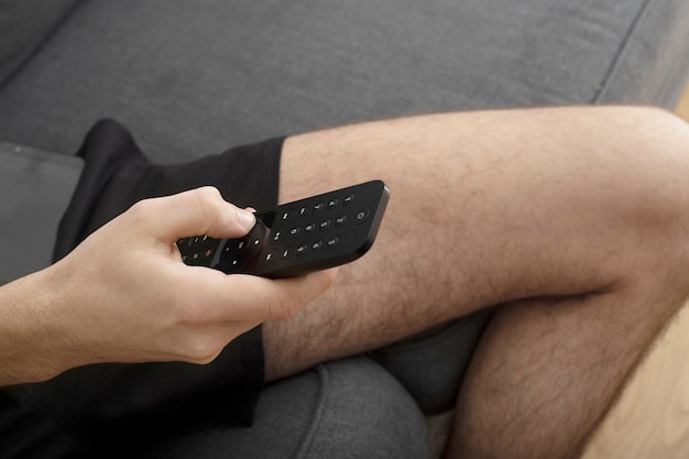 hand holding a tv control