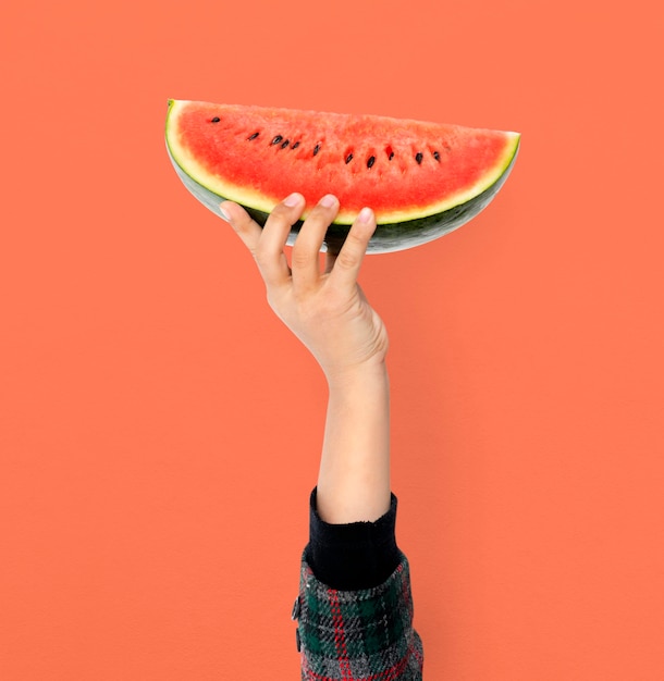 Hand Holding Watermelon Isolated Concept