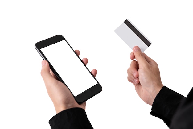 Hand Holding white Credit Card and Mobile Phone Blank Screen