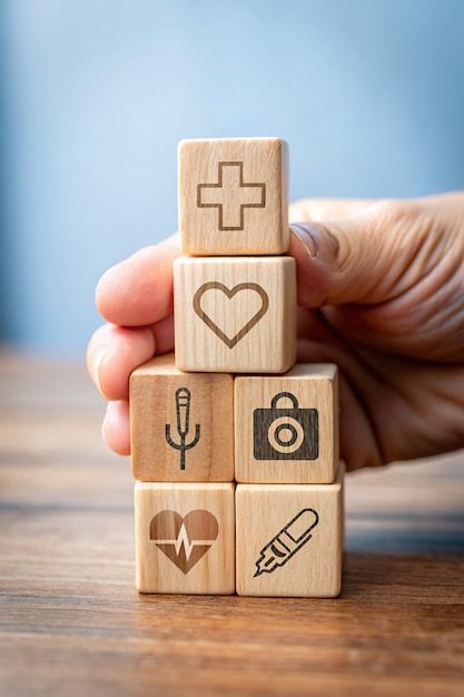 Photo hand holding wooden block and icon healthcare medical life insurance of people health insurance concept