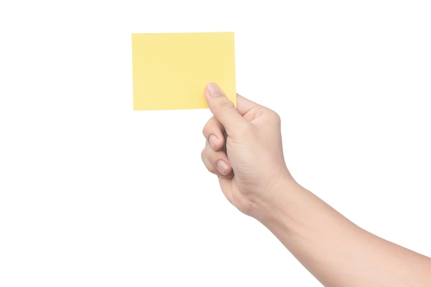 Hand holding yellow paper isolated on white with clipping path
