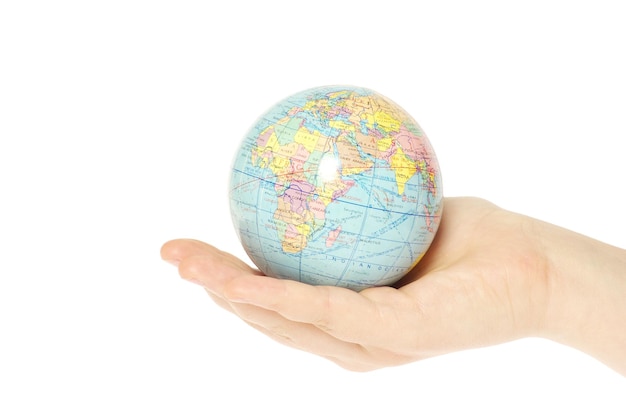 Hand holdings a globe on a white