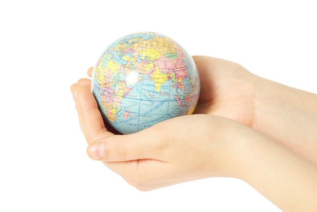 Hand holdings a globe on a white