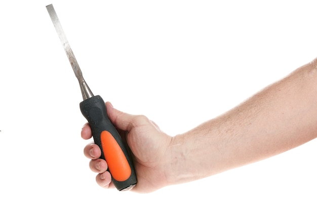 Hand holds a chisel on a white background template for designers