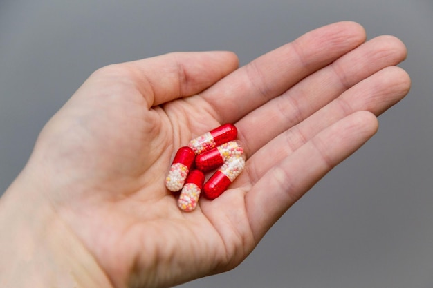 hand holds medicine pills