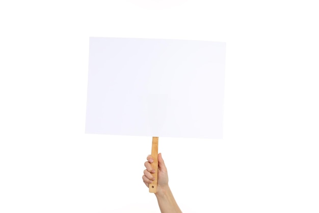 Hand holds protest sign isolated on white background