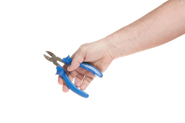 Hand holds side cutters on a white background a template for designers