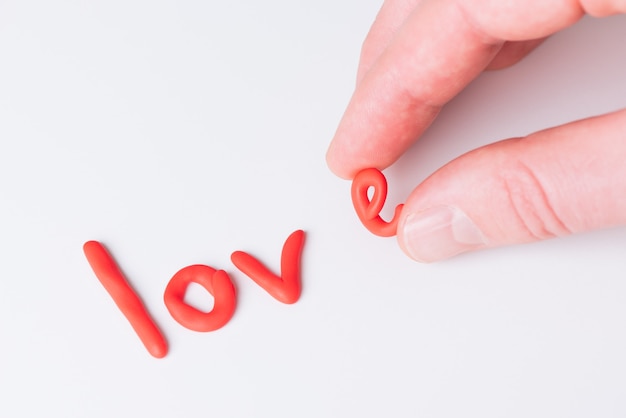 Hand made word love on white background