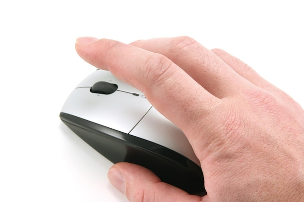 Hand of a man clicking a mouse button top view isolated on white focus on the finger