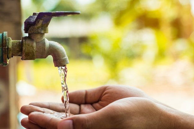 hand open for drinking tap water