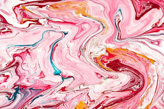 Hand painted background pink white and yellow mixed acrylic paints liquid marble texture