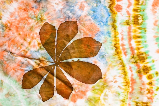 Hand painted brown chestnut leaf on silk batik