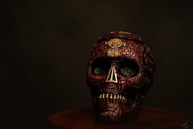 Hand painted plaster skull. Decorative caravel for Day of the Dead celebration.