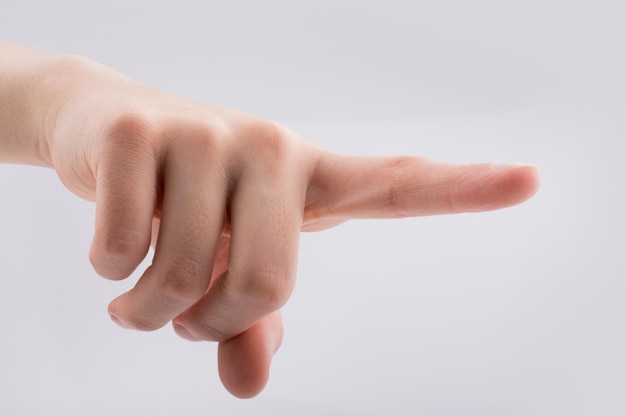 Hand pointing on white background