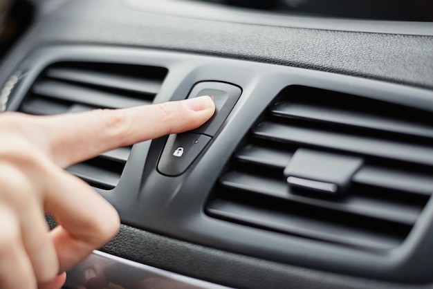 Hand press emergency stop button in the car