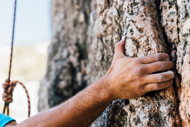 Hand of rock climber