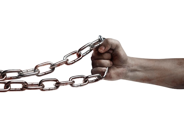 The hand of a scary zombie with blood and wounds tied on the iron chain is isolated over a white background