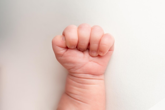 hand of a small child close-up. a little happiness.