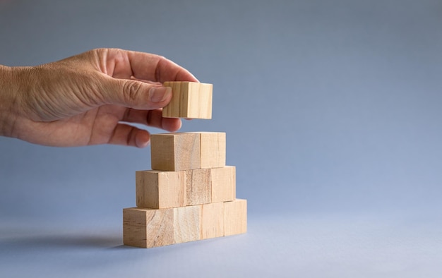 Hand stacking wood blocks