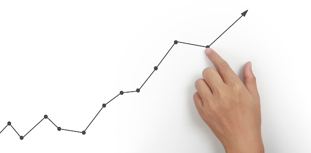 Hand touching a graphs of financial indicator and accounting market economy analysis chart