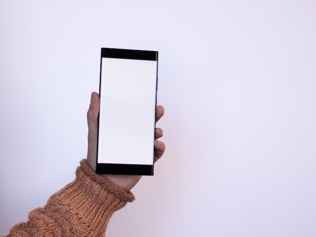 Hand with mobile on white background