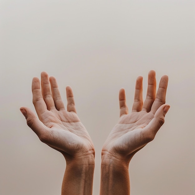 a hand with a red and white design on it