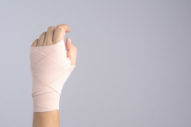 Hand with strapped bandage