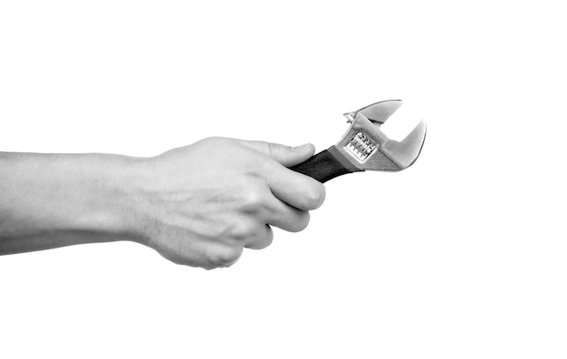 Hand with wrench repair tool isolated on white improvement