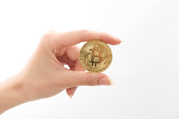 Hand Of Woman Holding Bitcoin