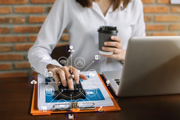 Hand women doing finances and calculate on desk about cost at home office