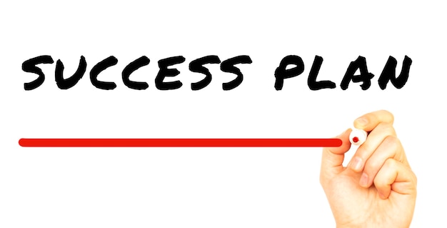 Hand writing SUCCESS PLAN with red marker