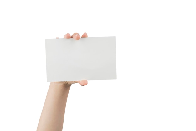 Hand of a young woman holding a white cardboard to mount an image or advertising text with a white background