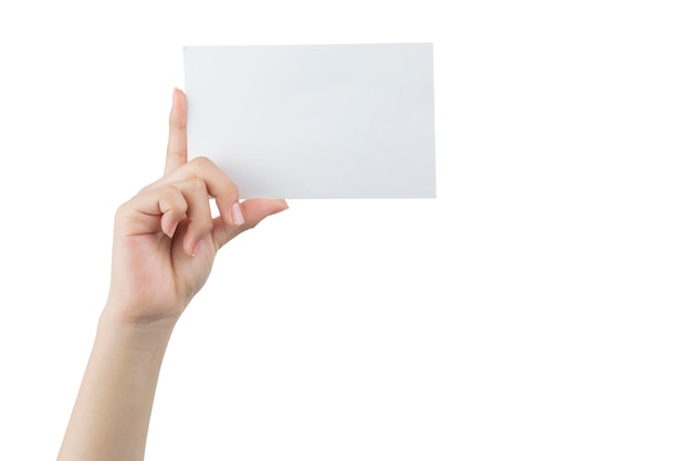 Hand of a young woman holding a white cardboard to mount an image or advertising text with a white background