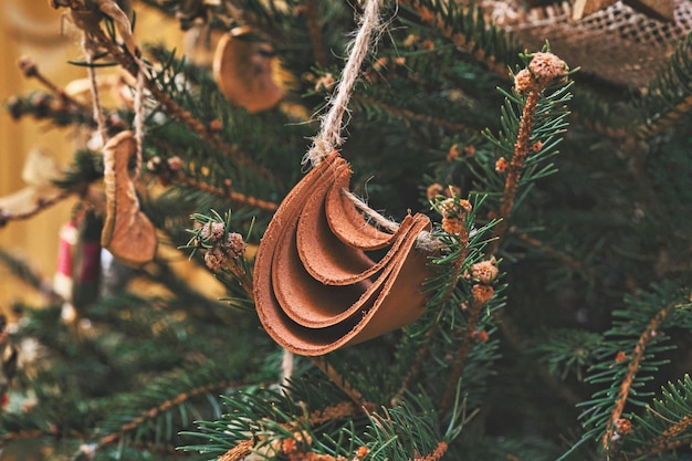 Handcrafted Christmas tree decoration from natural leather waste left after production