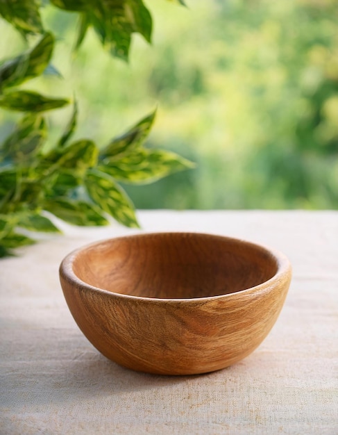 Photo handcrafted wooden bowl empty bowl for food mockup closeup natural backdrop