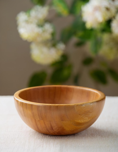 Photo handcrafted wooden bowl empty bowl for food mockup closeup natural backdrop