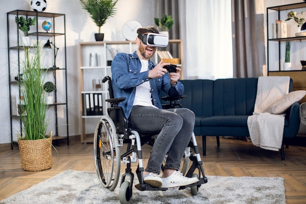 Handicapped man in virtual glasses playing games