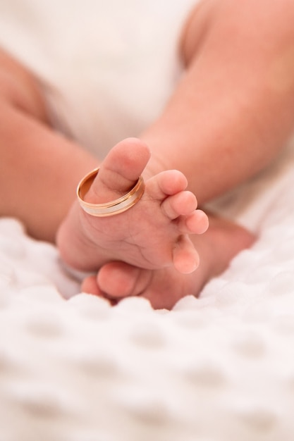 Handles and legs of the newborn baby