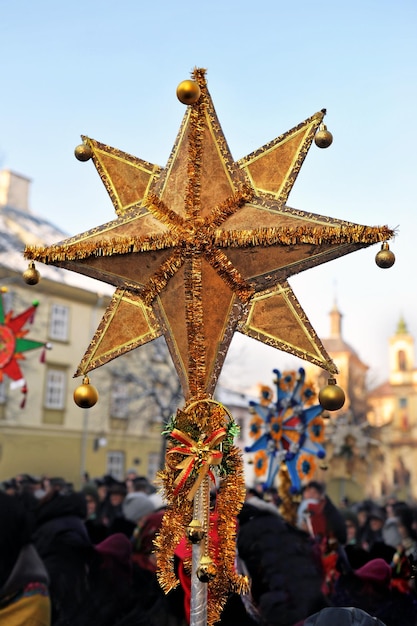 Handmade Christmas star - a traditional attribute of the Christmas rite of caroling